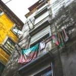 low-angle photo of grey building